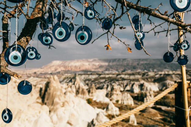 glass amulets hanging on tree